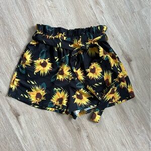 High waisted sunflower paper bag shorts.